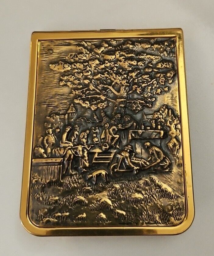 A GOLD TONE PRODUCT SECRETARY PICTURE ADDRESS WALLET - CIRCA 1945