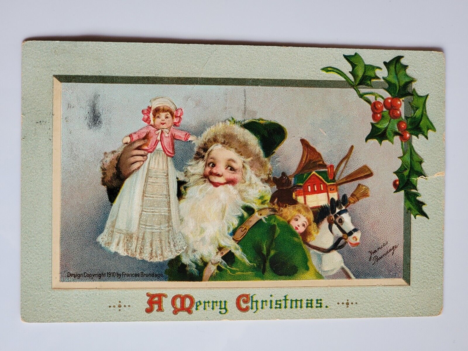 c1910\'s Christmas Red Cross Stamp Embossed Toys Rocking Horse Postcard Posted 