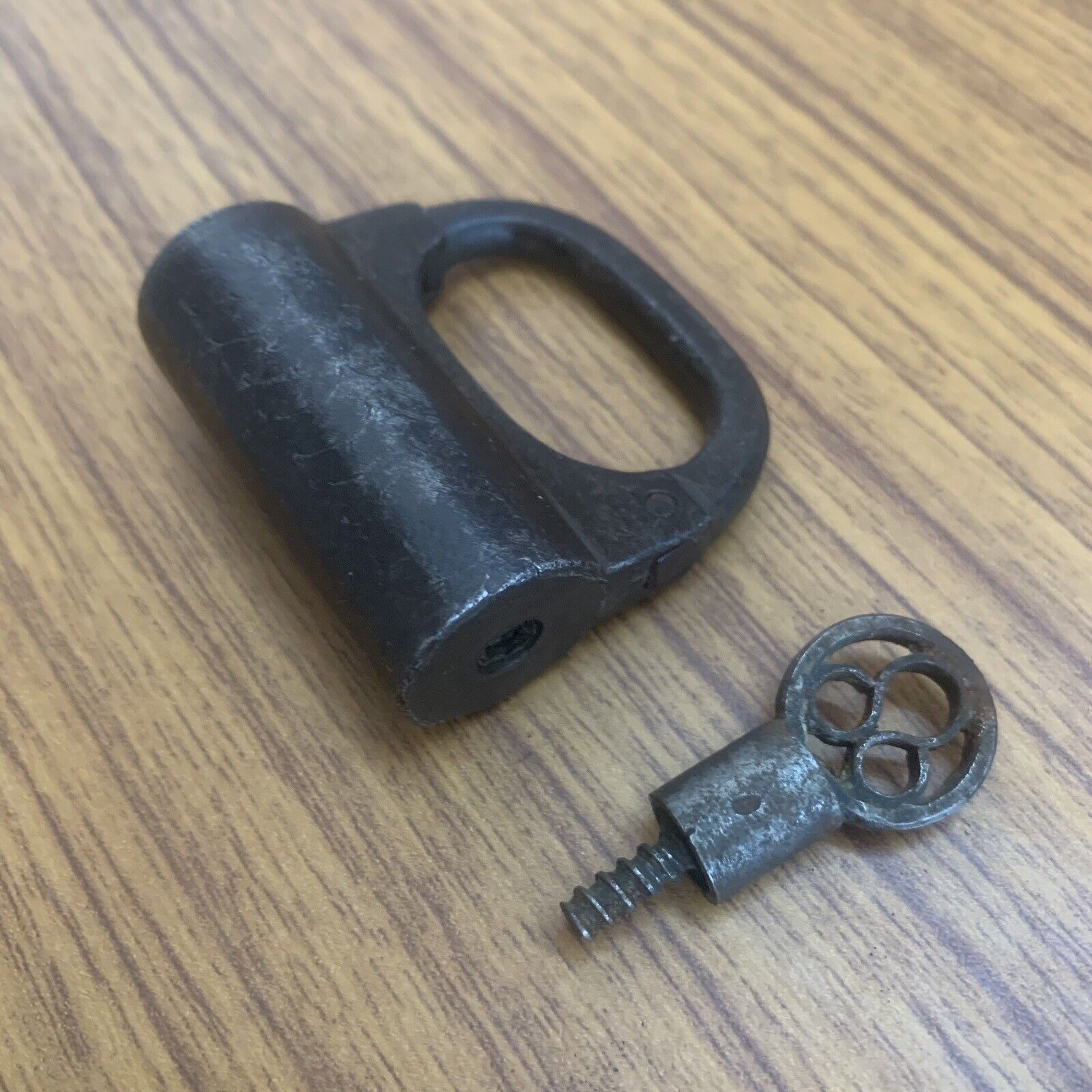 An Old or antique Iron padlock  lock with SCREW TYPE key decorative shape.