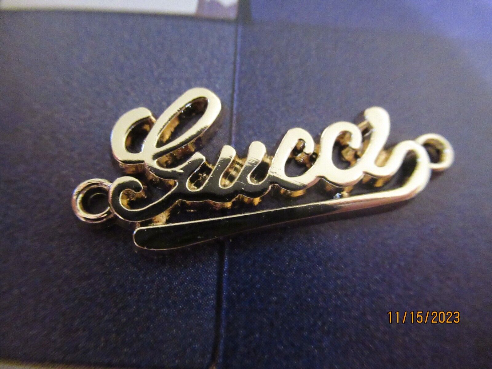 GUCCI ZIP PULL   32x14MM soft gold tone,   THIS IS FOR 1