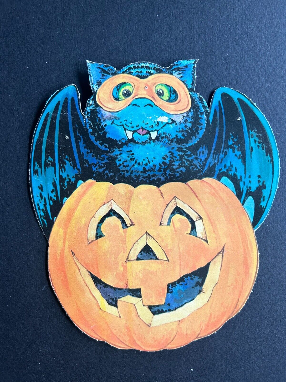 Vintage Halloween Decoration: Bat and Smiling Pumpkin