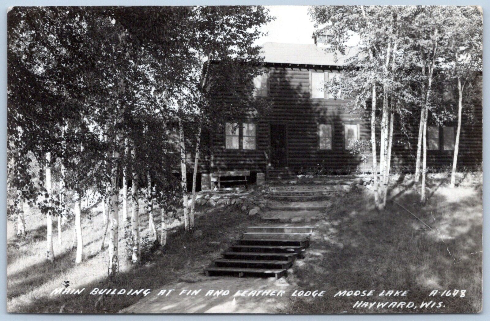 Postcard RPPC Hayward WI Main Building At Fin And Feather Lodge Moose Lake R50