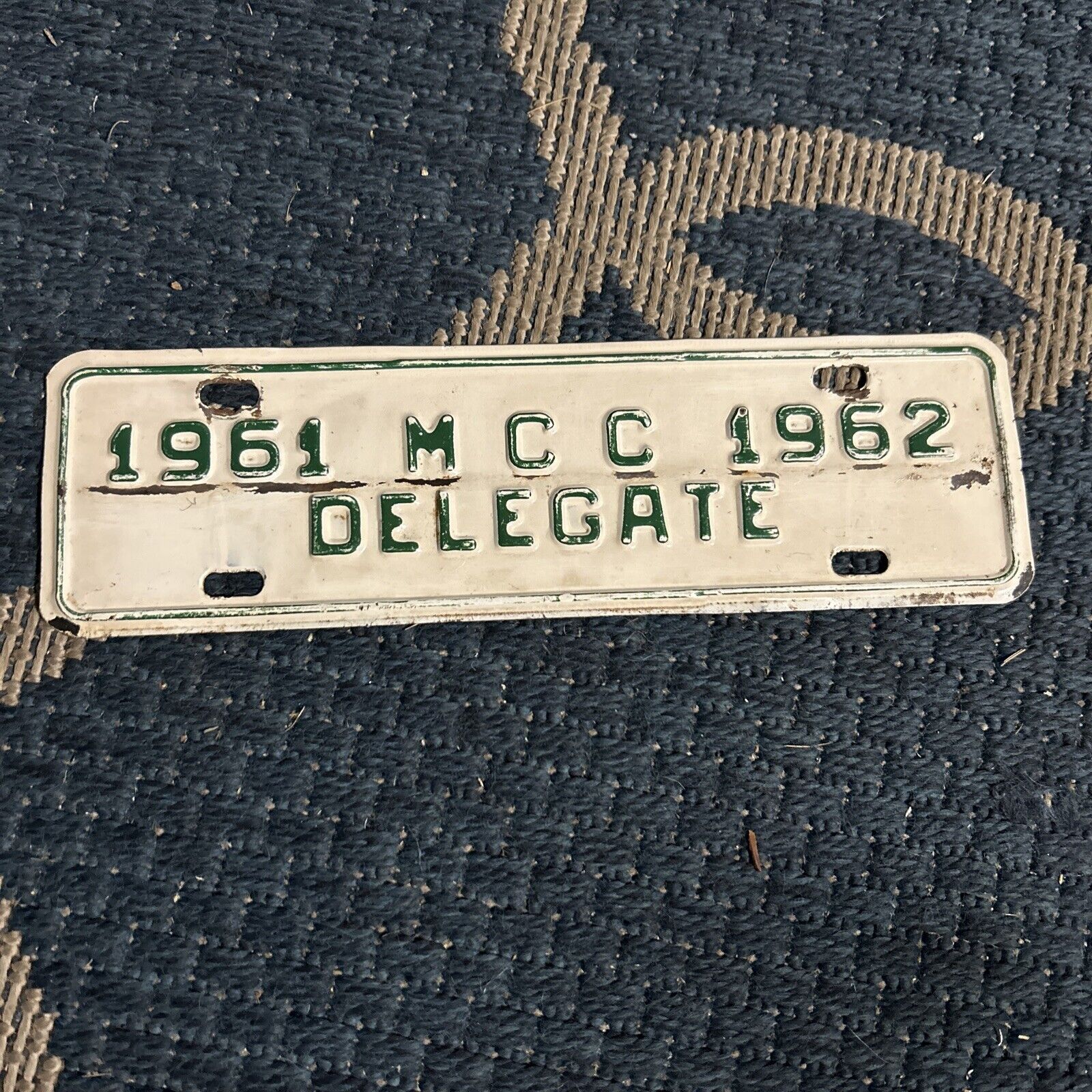 Vintage M C C Delegate 1961 1962 License Plate 3.25”x11” Metal Auto Garage
