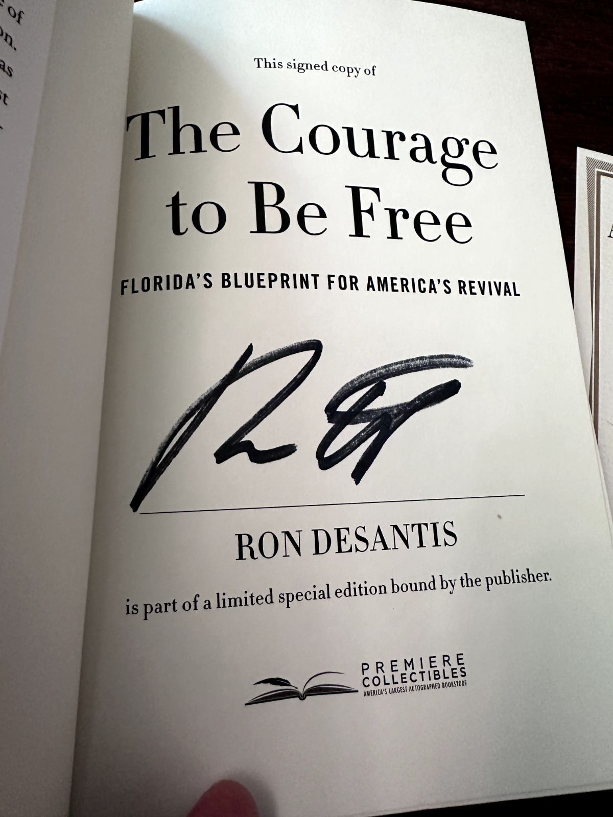 Florida Governor Ron DeSantis signed book The Courage to be Free