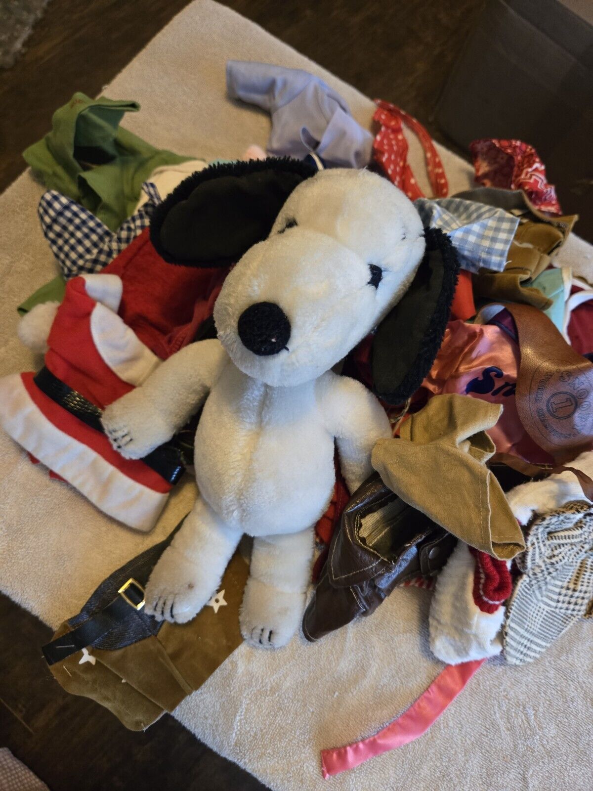 Vintage 1968 Snoopy plush with 48 pieces of clothing, and accessories..