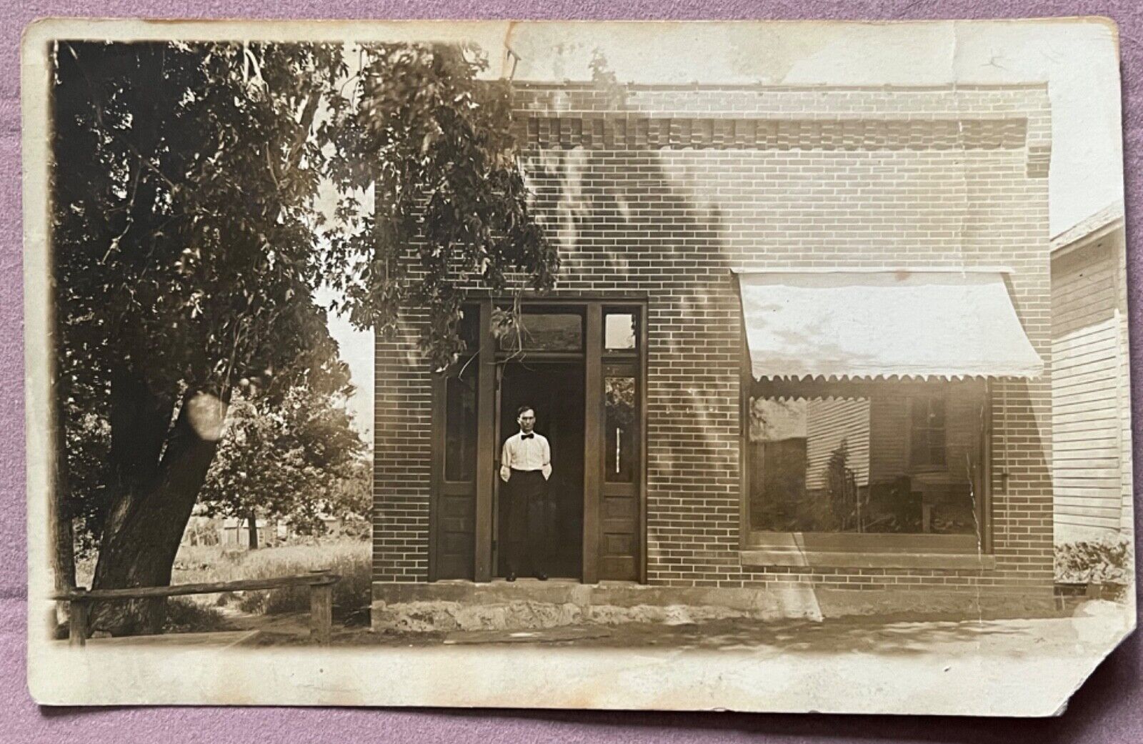RPPC Shopkeeper Man Bow Tie Arm Garters Antique Real Photo Postcard c1910