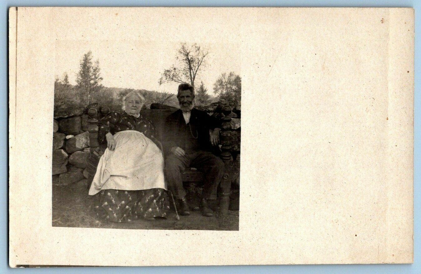 RPPC Postcard~ Elderly Couple Seated Outside