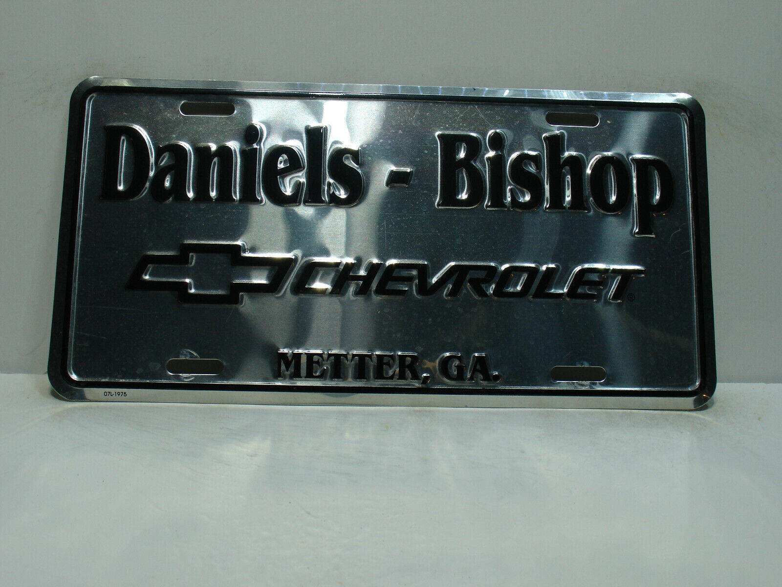 Booster License Plate   Daniels - Bishop     Chevrolet    Metter,  GA     9261