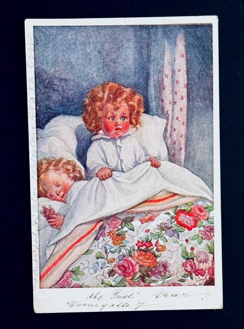 M.M Vienne Postcard - Austria to Germany Cancel & Stamp- Pretty Girl Doll in Bed