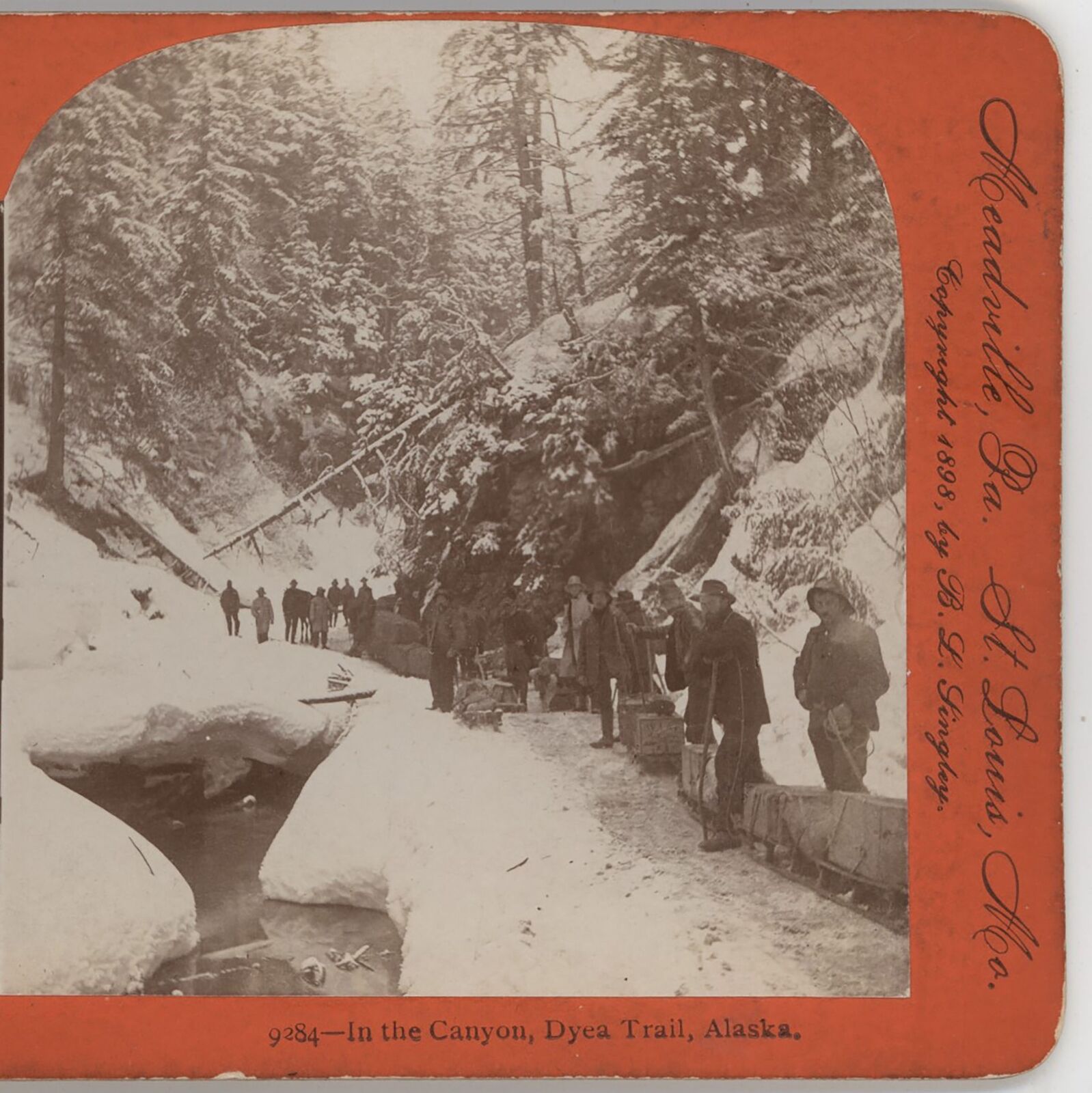 Gold Miners bringing supplies on Foot Canyon Dyea trail AK Stereoview 1898