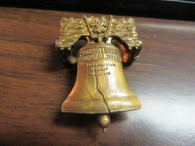 Liberty Bell Gold Plastic Slide, 1950's or 1970's       TH5