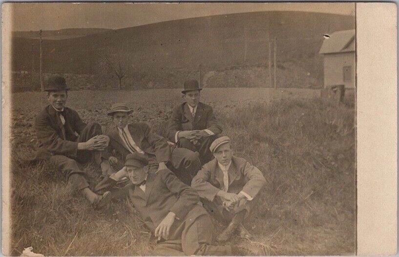 c1910s RPPC Real Photo Postcard Five Young Men in Suits Hanging out on Grass