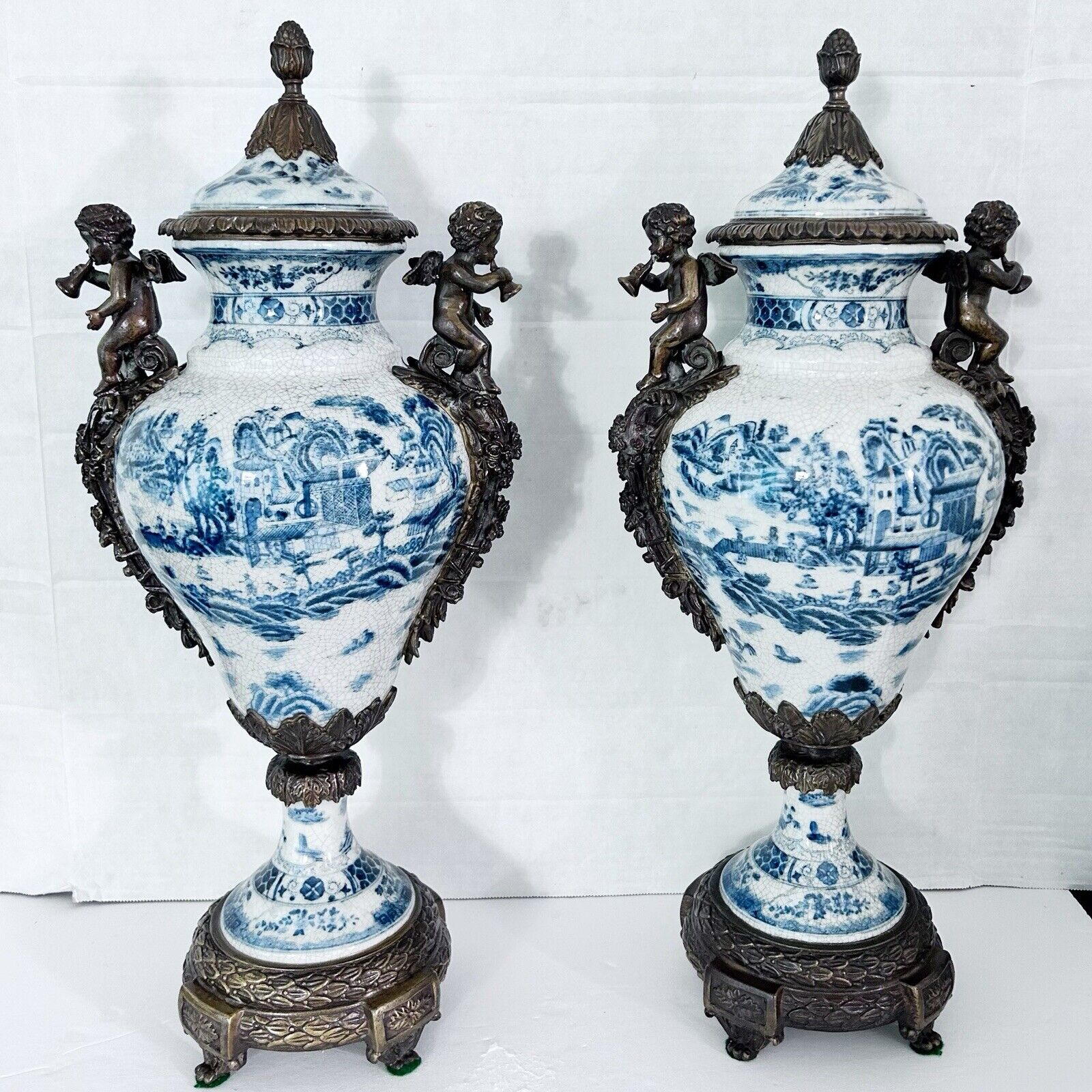 Pair of Castilian Blue and White Porcelain Urns with Bronze Cherubs Handle 22\