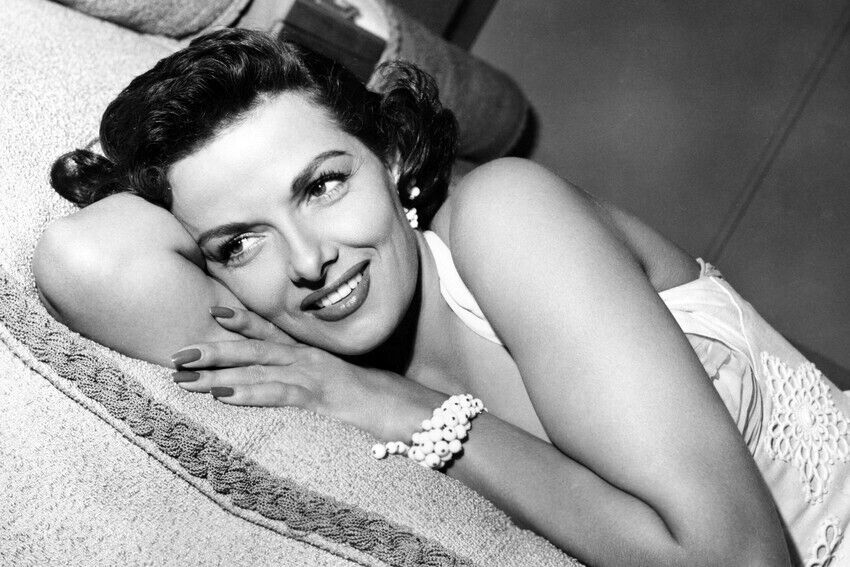 JANE RUSSELL LYING ON COUCH SLEEVELESS DRESS 24x36 inch Poster