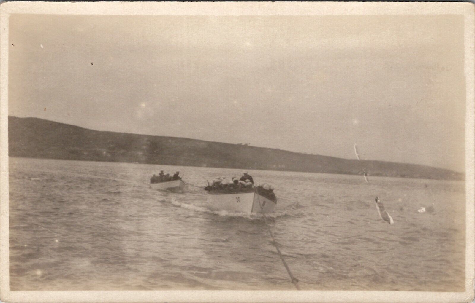 Military RPPC Navy Sailors in Boats Towed by Rope c1910 Real Photo Postcard V14