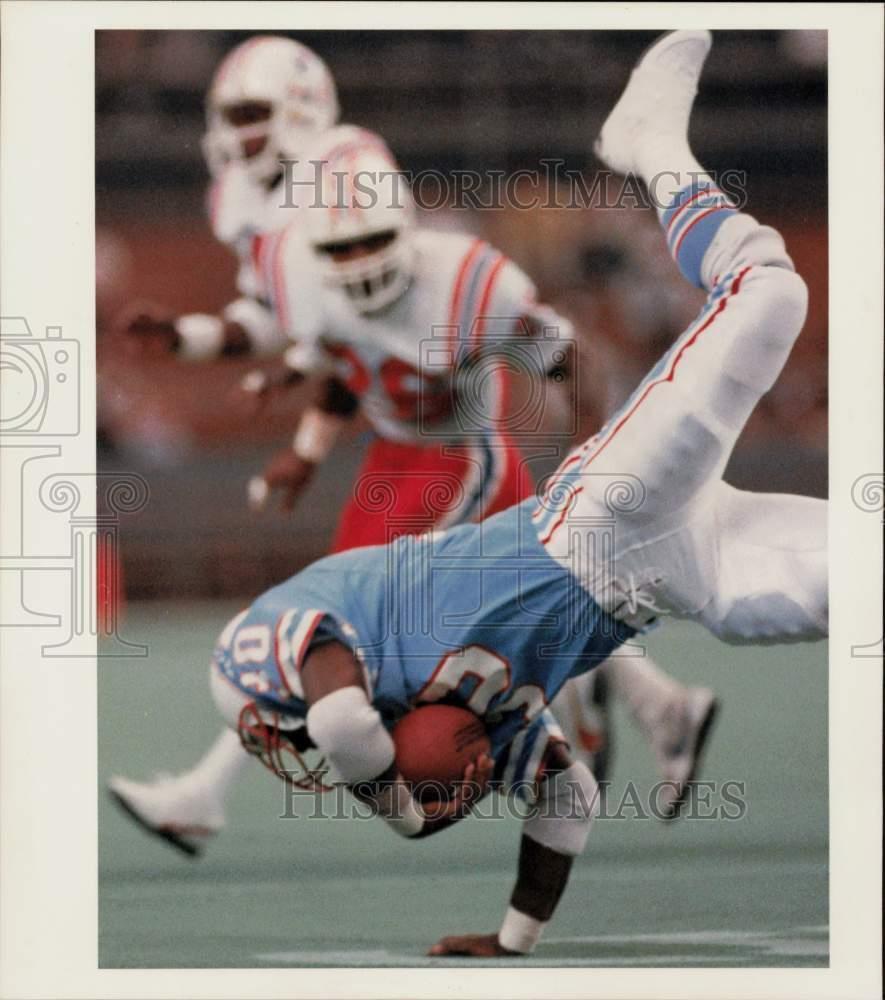 1987 Press Photo Houston Oilers Footballer Leonard Harris Stumbles after Catch