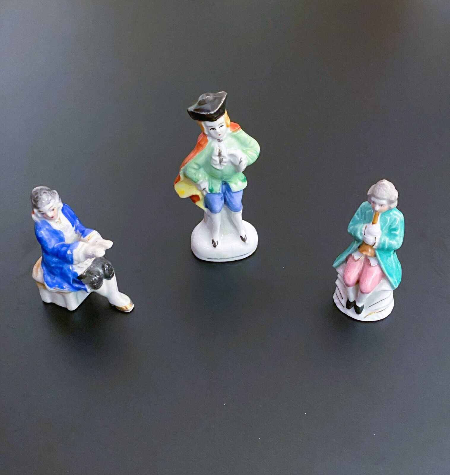Vintage Occupied Japan Figurines 3 Piece Lot, Flute Man, Colonial Man, Piano Man