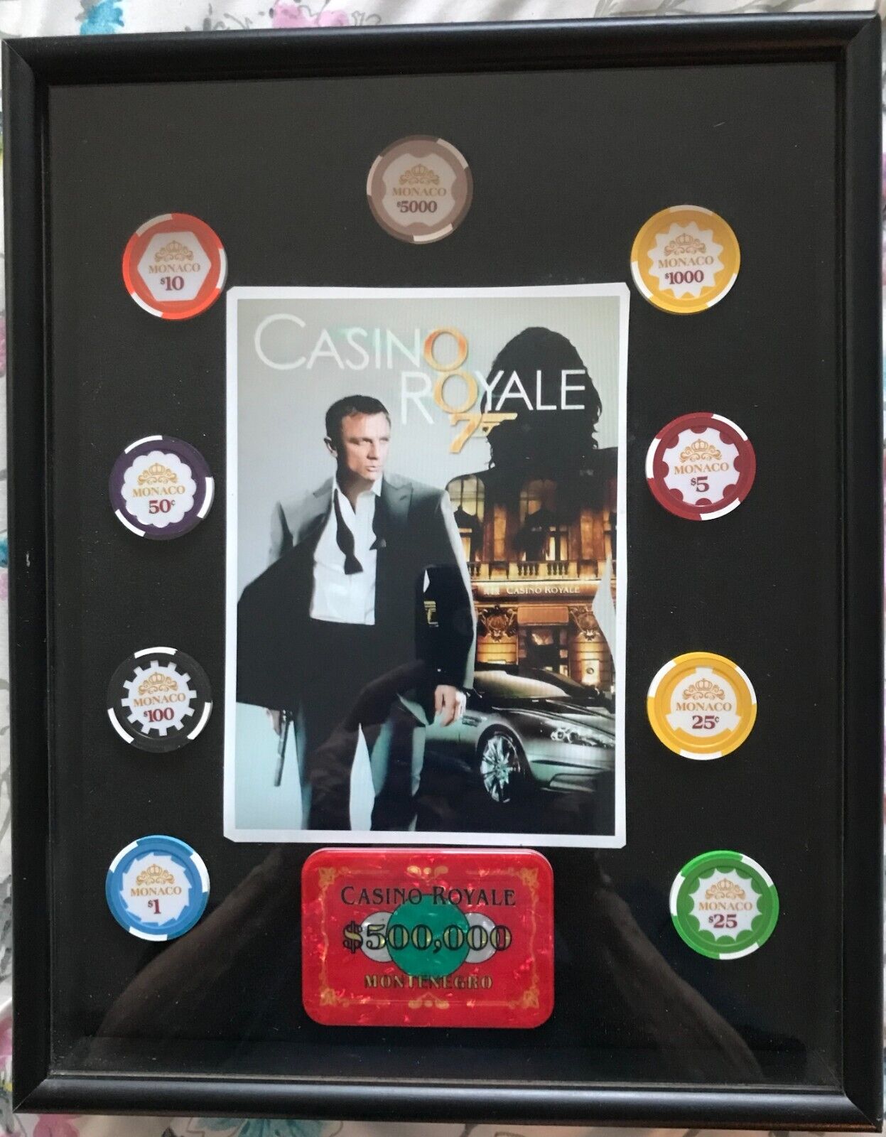 Casino Royal picture of James Bond & $500,000 poker plaque + 9 chips, box framed