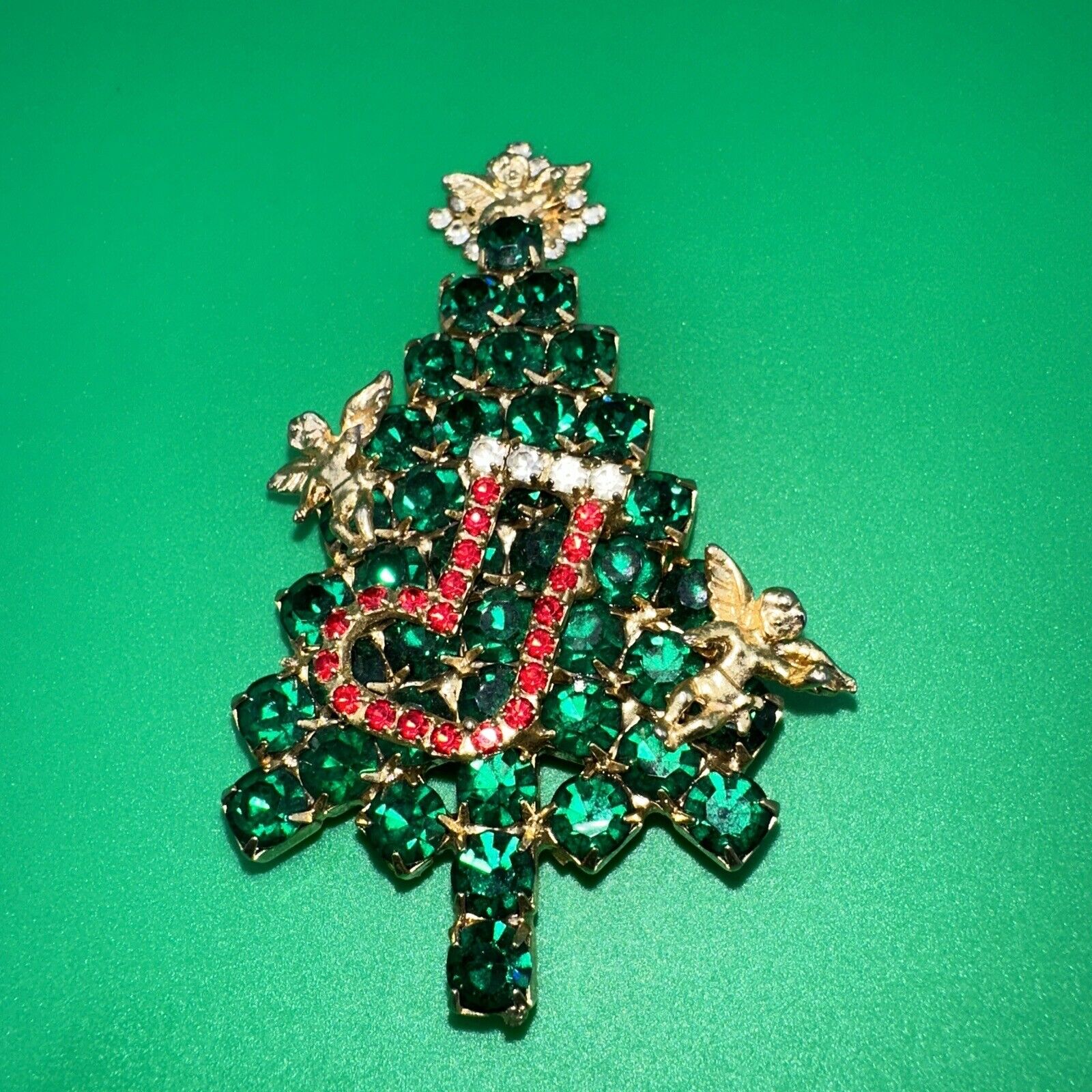 Vintage Unsigned ATTRUIA Christmas Tree Pin Green Red Cl Rhinestones  Cherubs