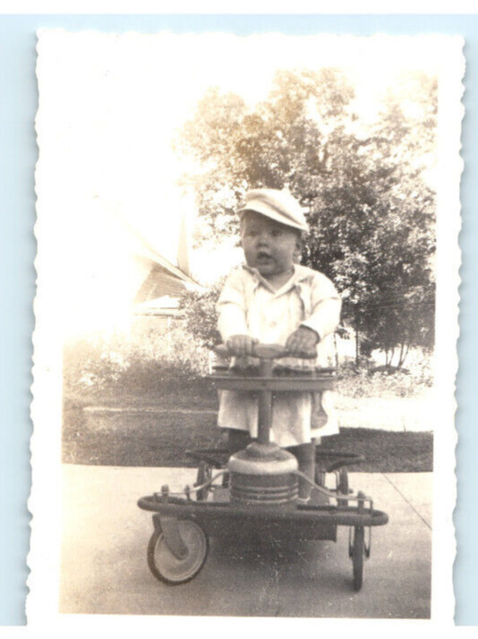 Vintage Photo 1940s, dapper toddler in antique bouncer, 3.5 x 2.5