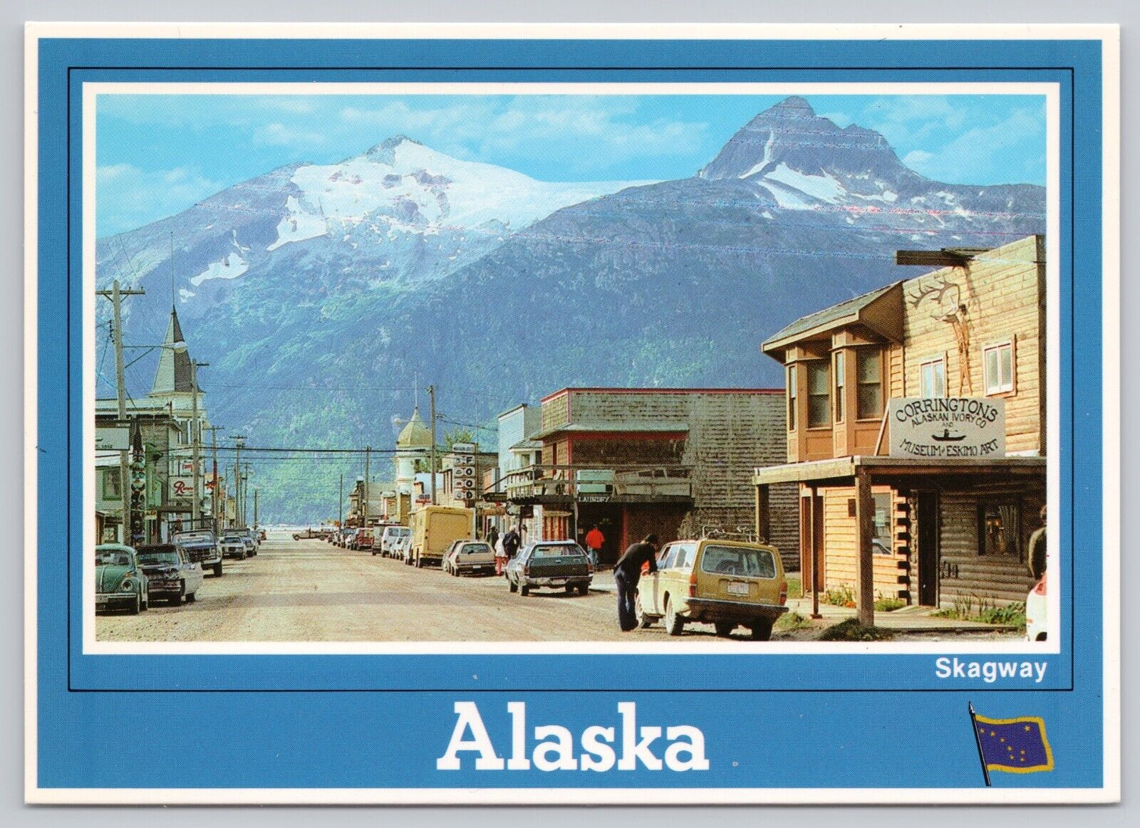 Skagway Alaska, Trail of 98 Street View Old Cars Shops Mountains, VTG Postcard