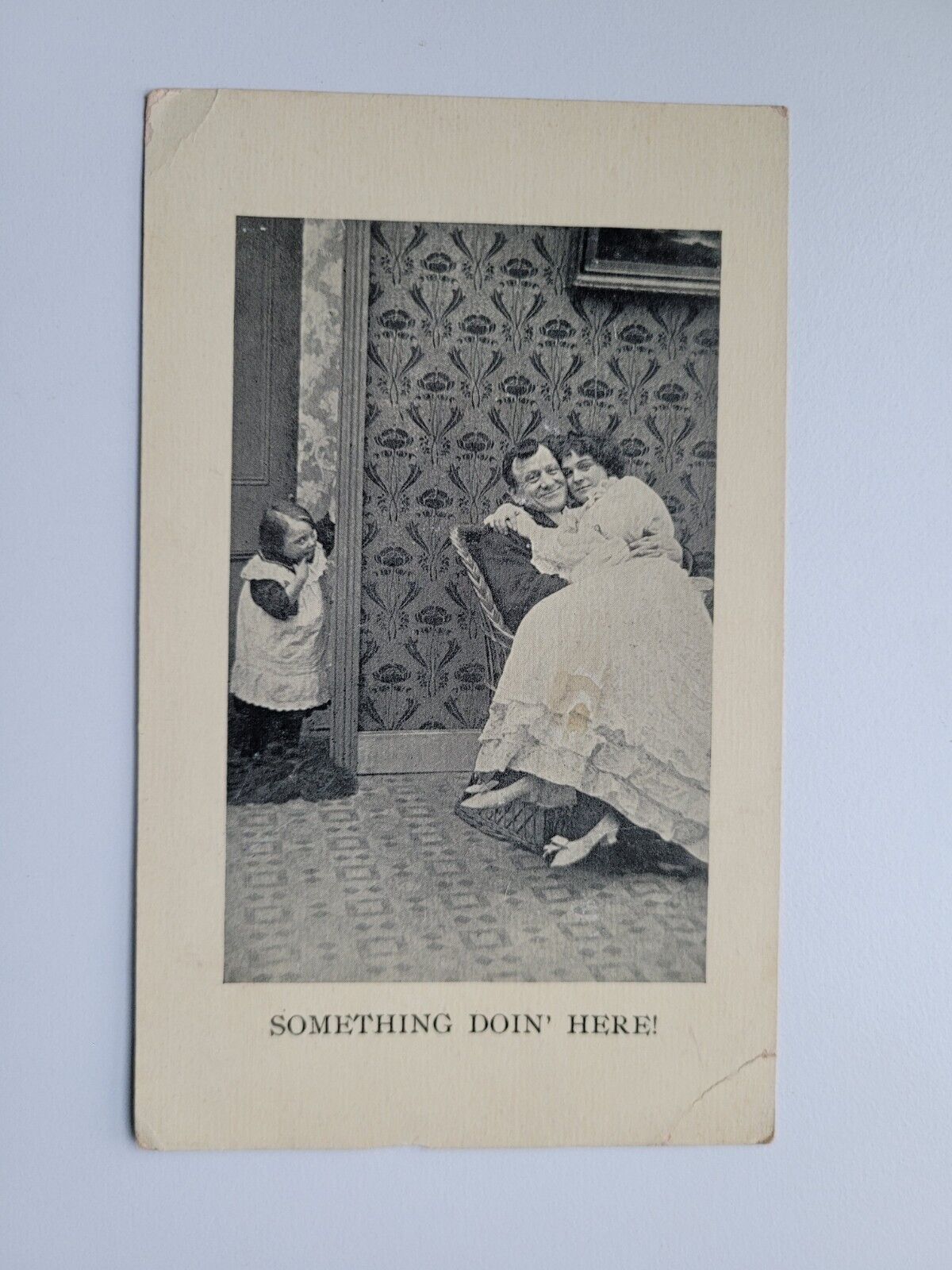 Something Doing Here Child Looking Lovers Cuddling Romance Vintage Postcard 1914