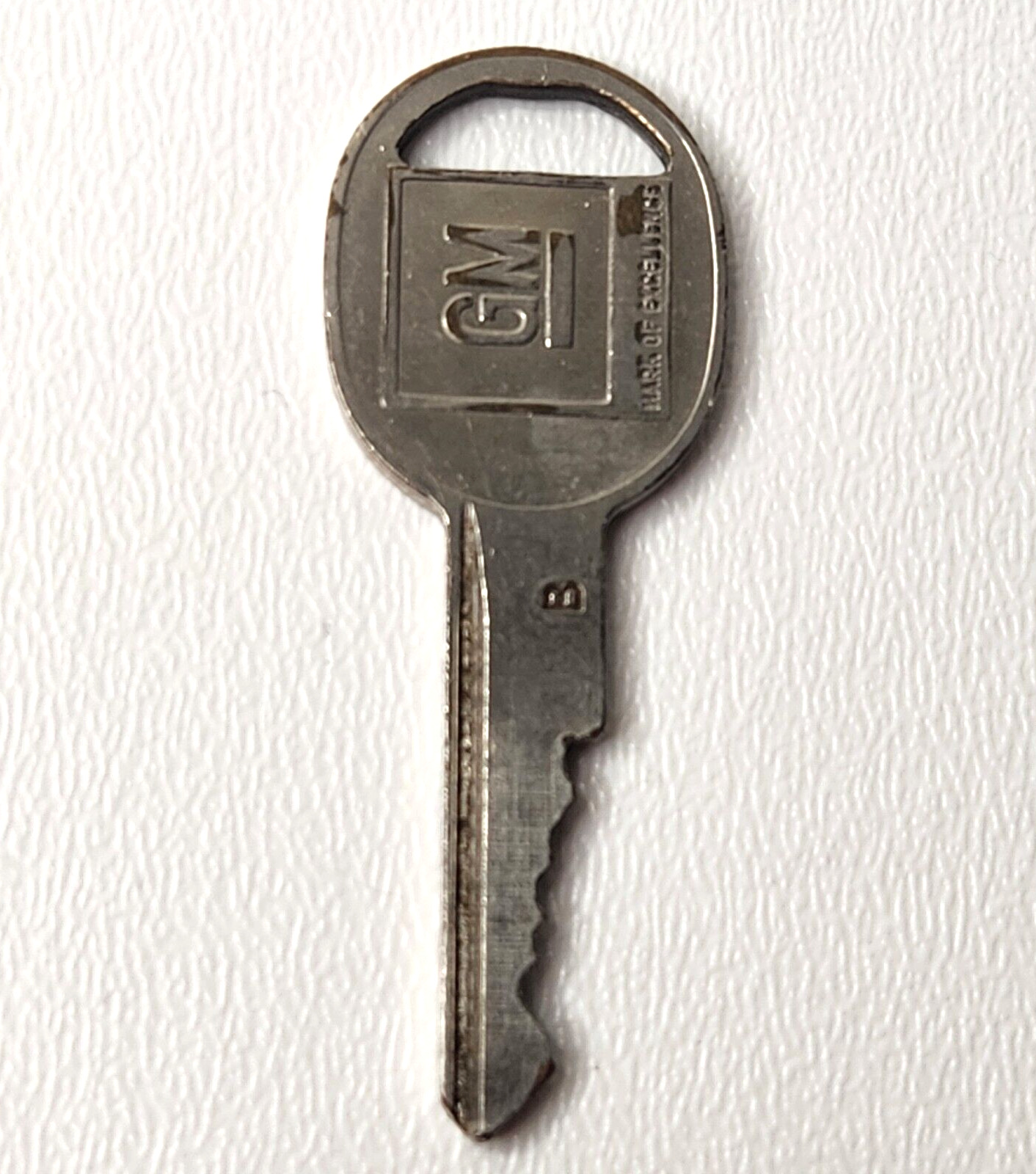 GM B Mark of Excellence Automotive Ignition Key Silver Vintage