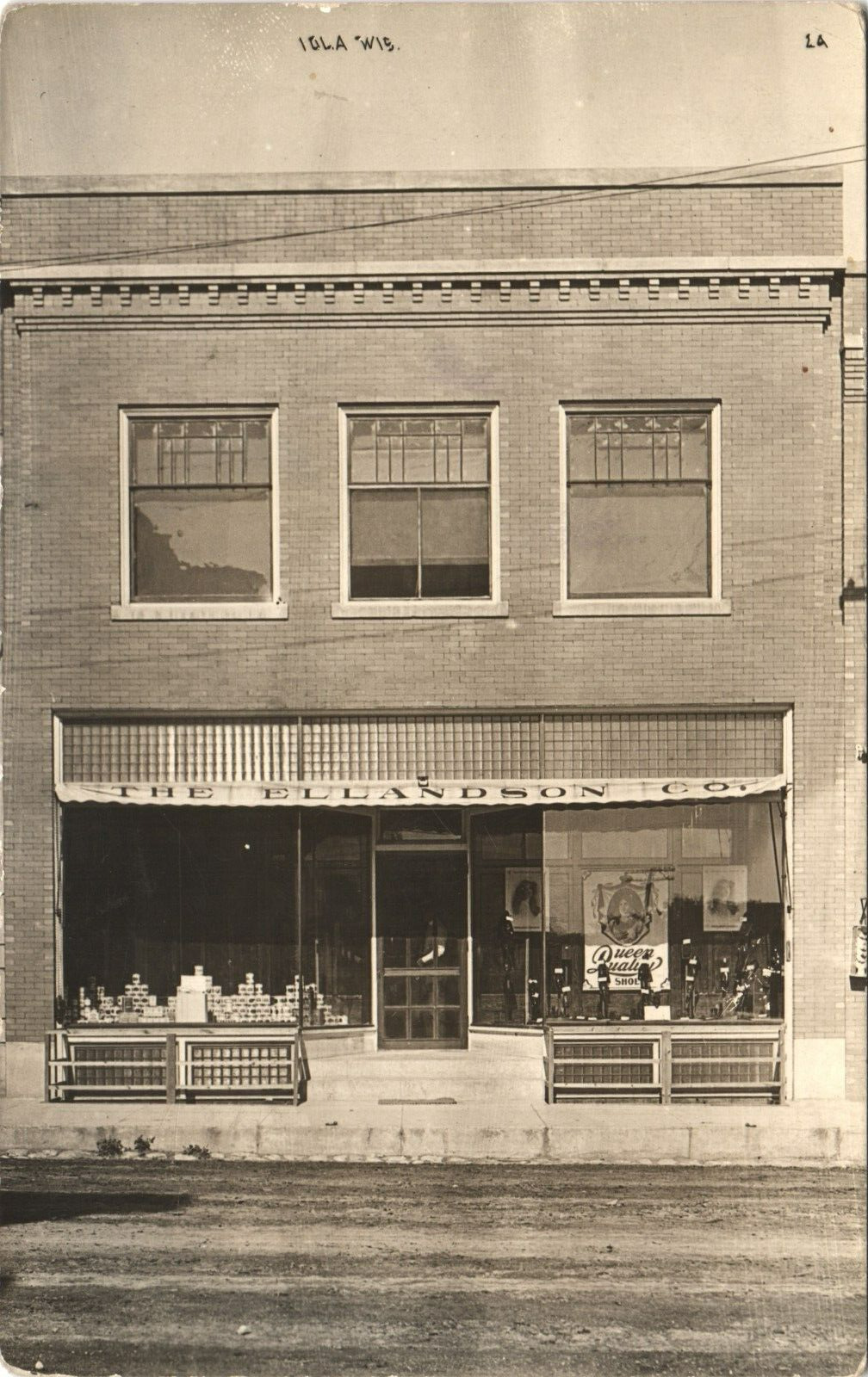 STORE FRONT original real photo postcard rppc IOLA WISCONSIN WI c1910 shoes