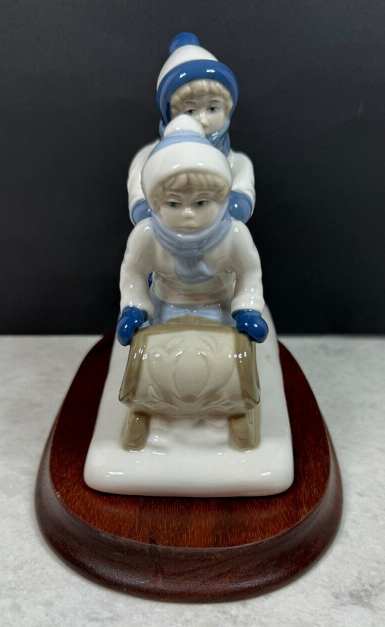 Vintage 1992 Paul Sebastian PS Boy & Girl on Sled Fine Porcelain Figurine