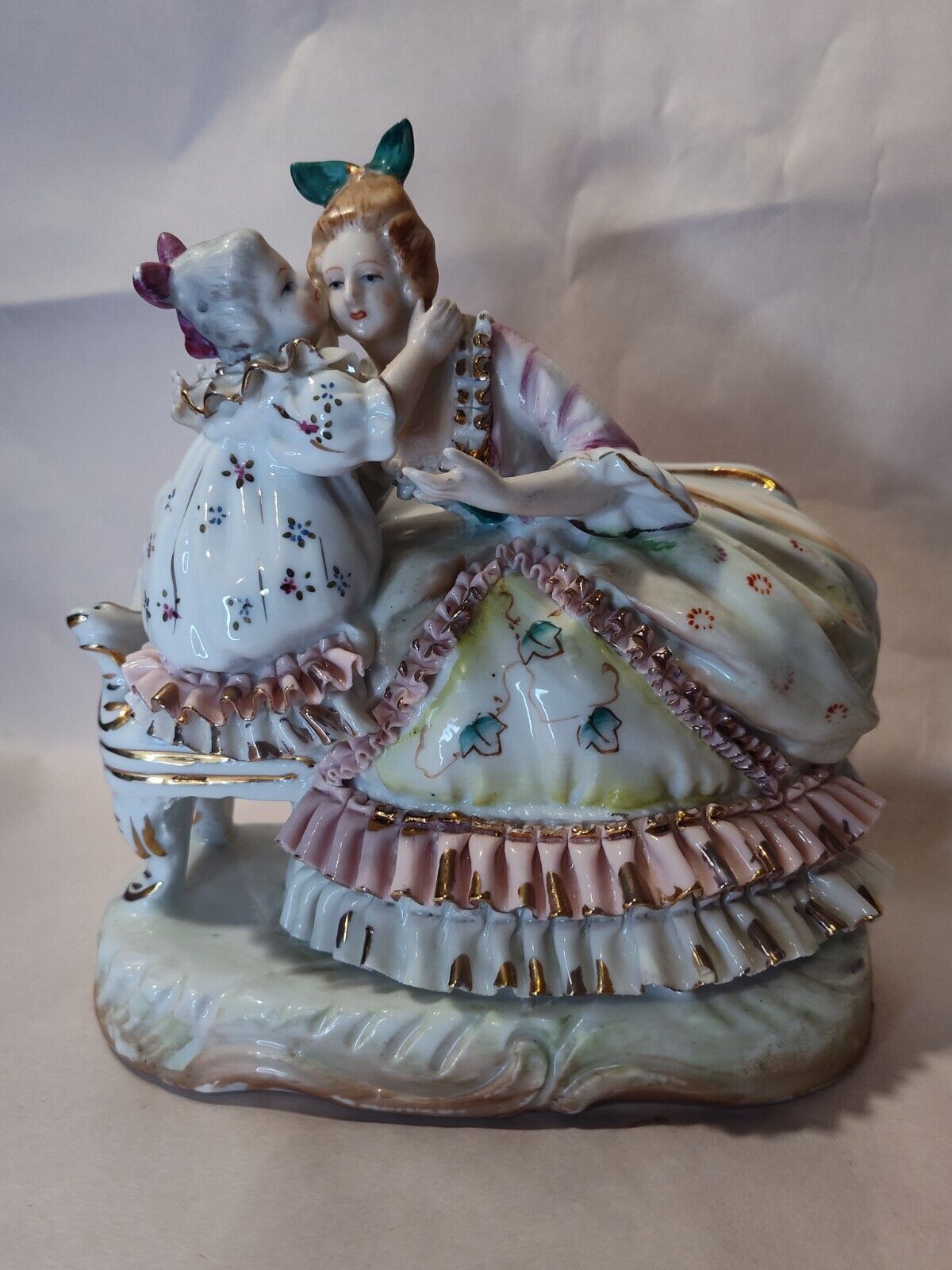 Mother and Daughter on Sofa Hand Painted  Bone China Lace Statue