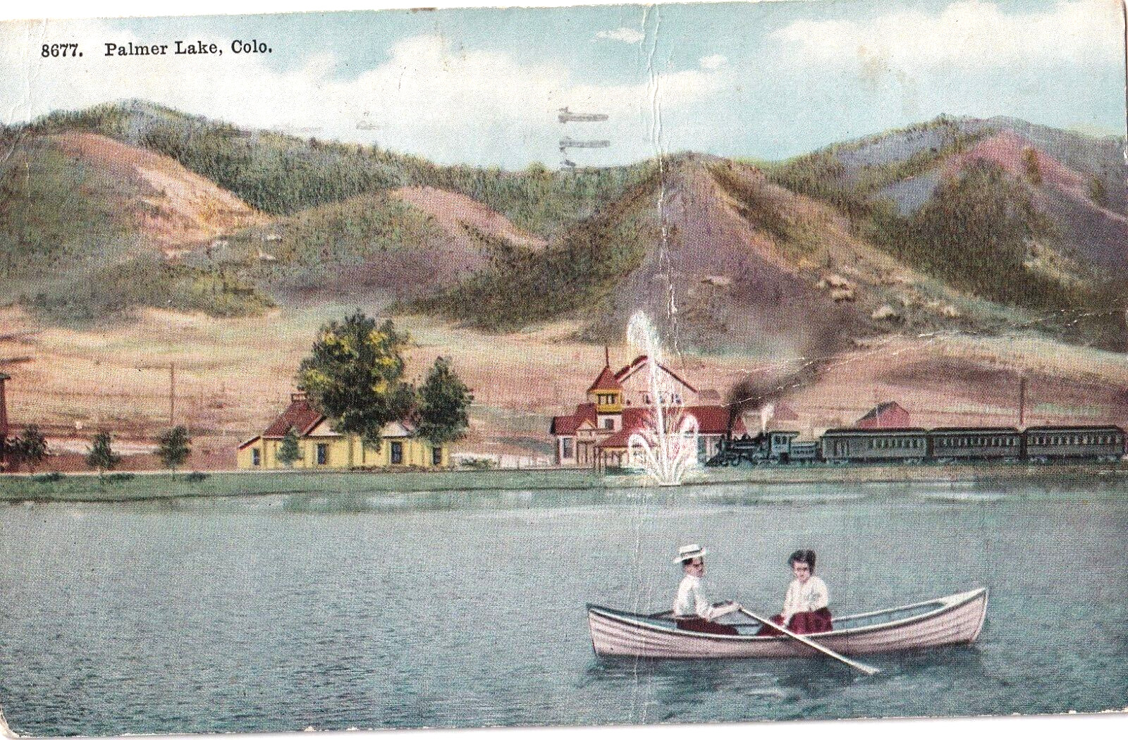 Palmer Lake Colorado 1922 Couple, Boating, Train Vintahe Postcard