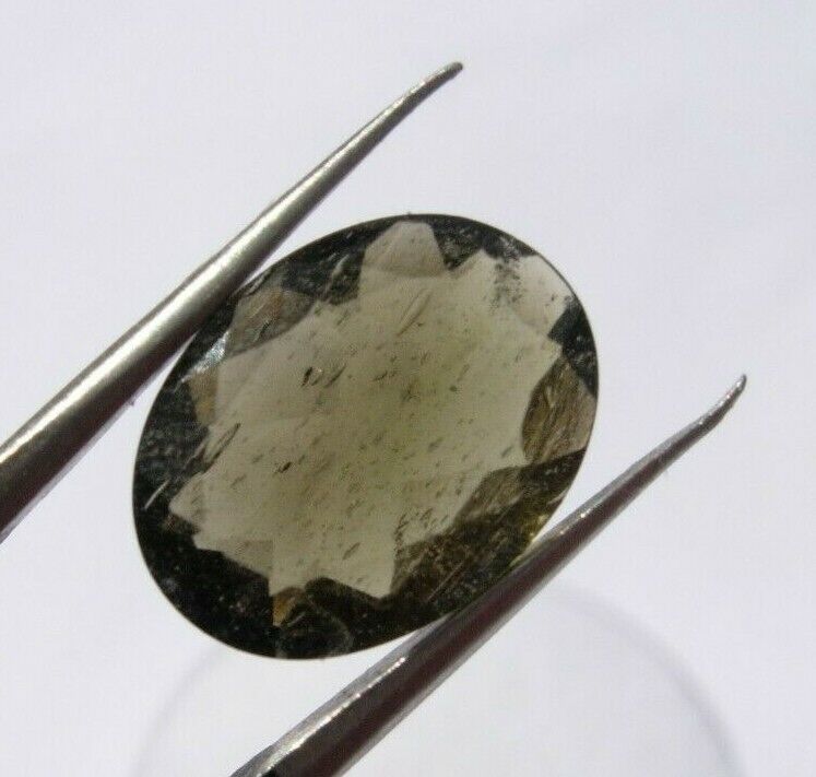 Authentic natural faceted Moldavite 2.64 carats oval shaped about 12x9x5mm