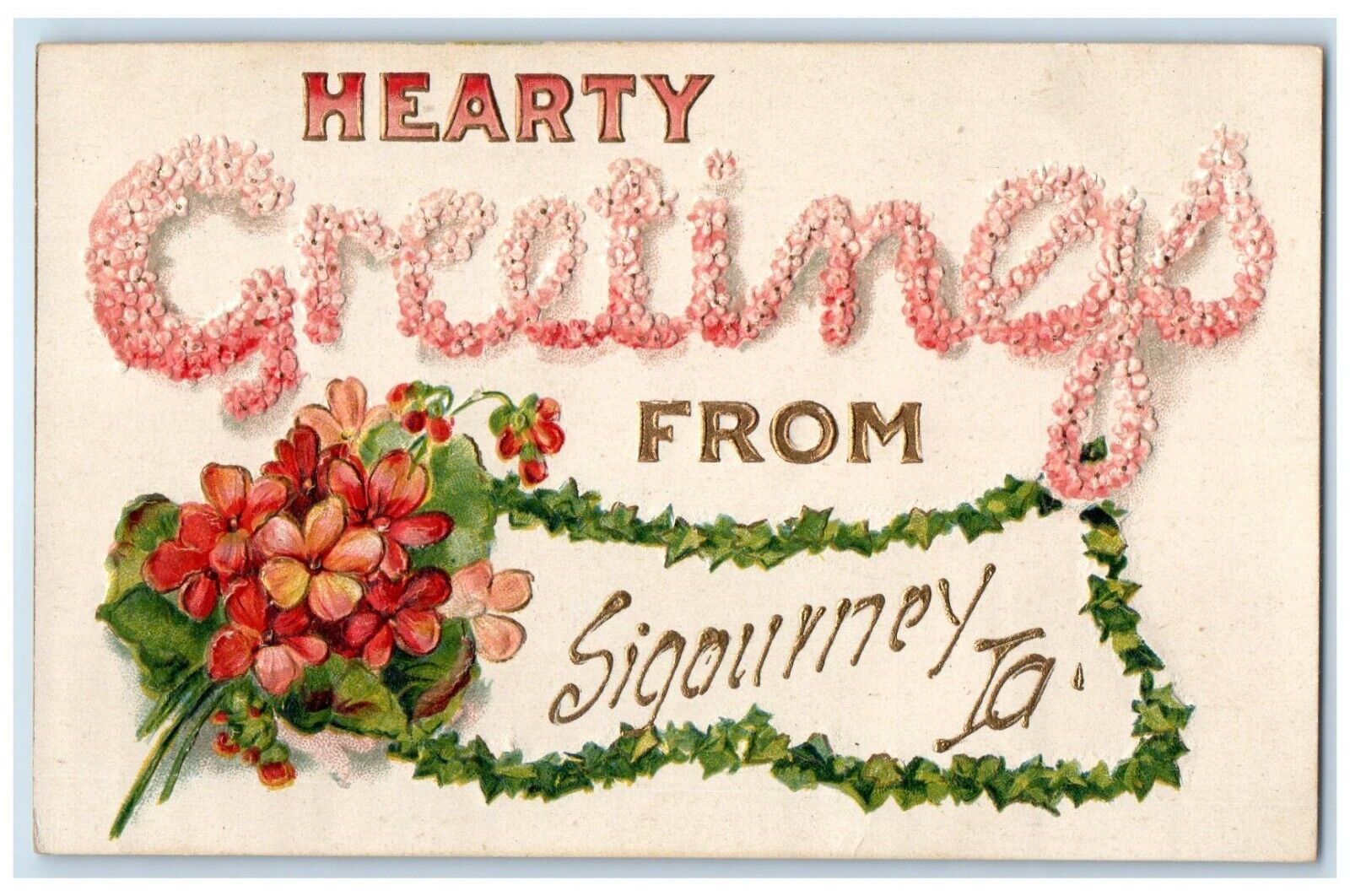 c1910's Hearty Greetings From Sigourney Iowa IA Flowers Embossed Postcard