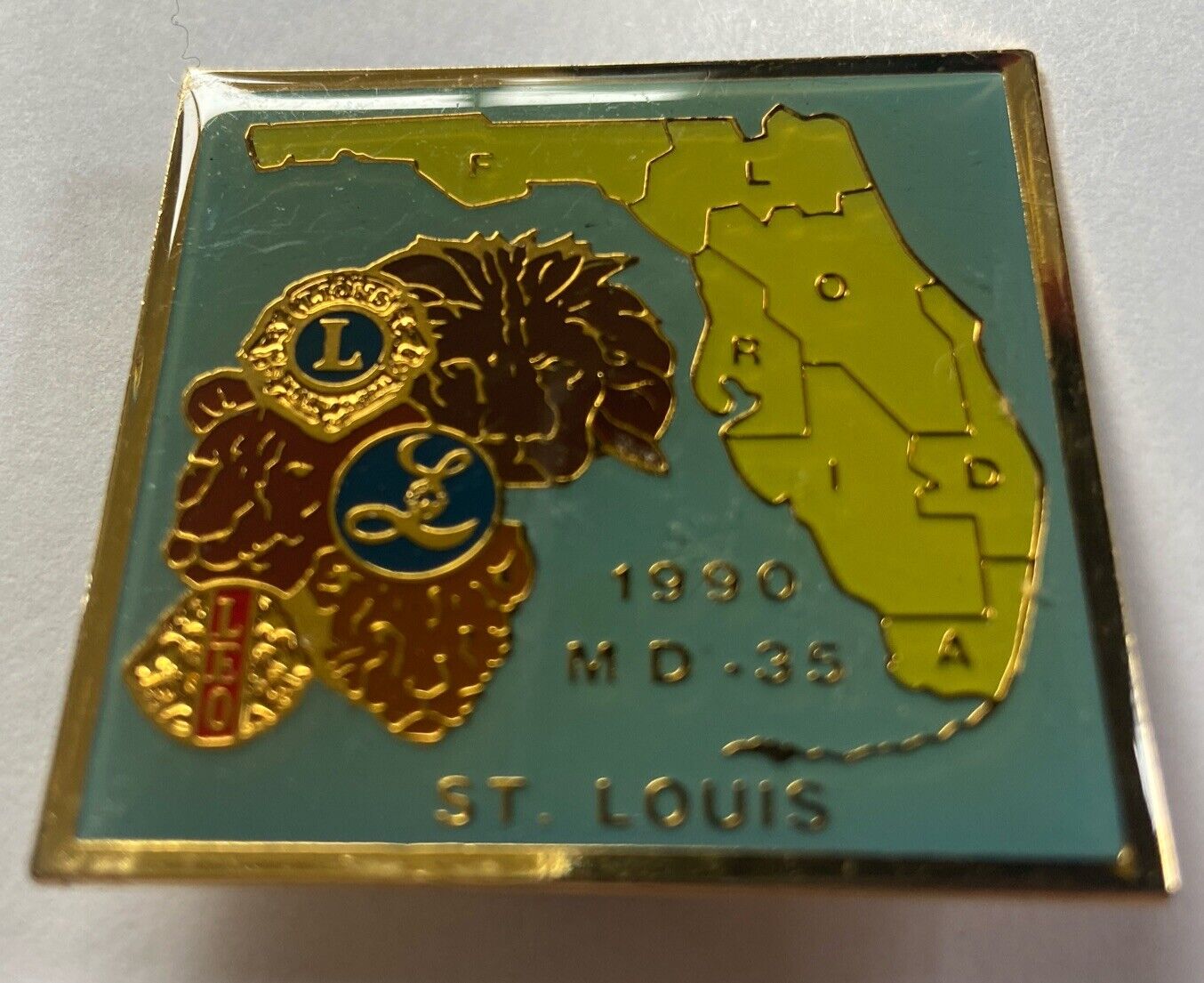 1990 LIONS CLUB ST. LOUIS M.D.-35 FLORIDA L E O ORIGINAL SOUVENIR CLUB RALLY PIN