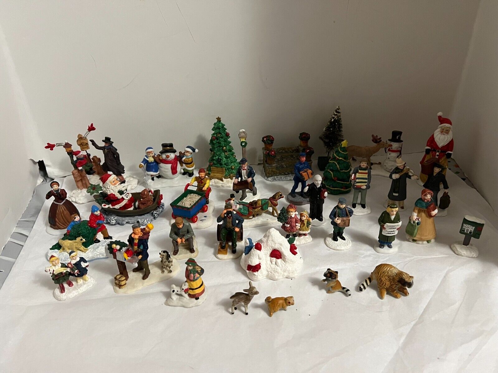 Lot of 34  Christmas Village Figurines Ceramic