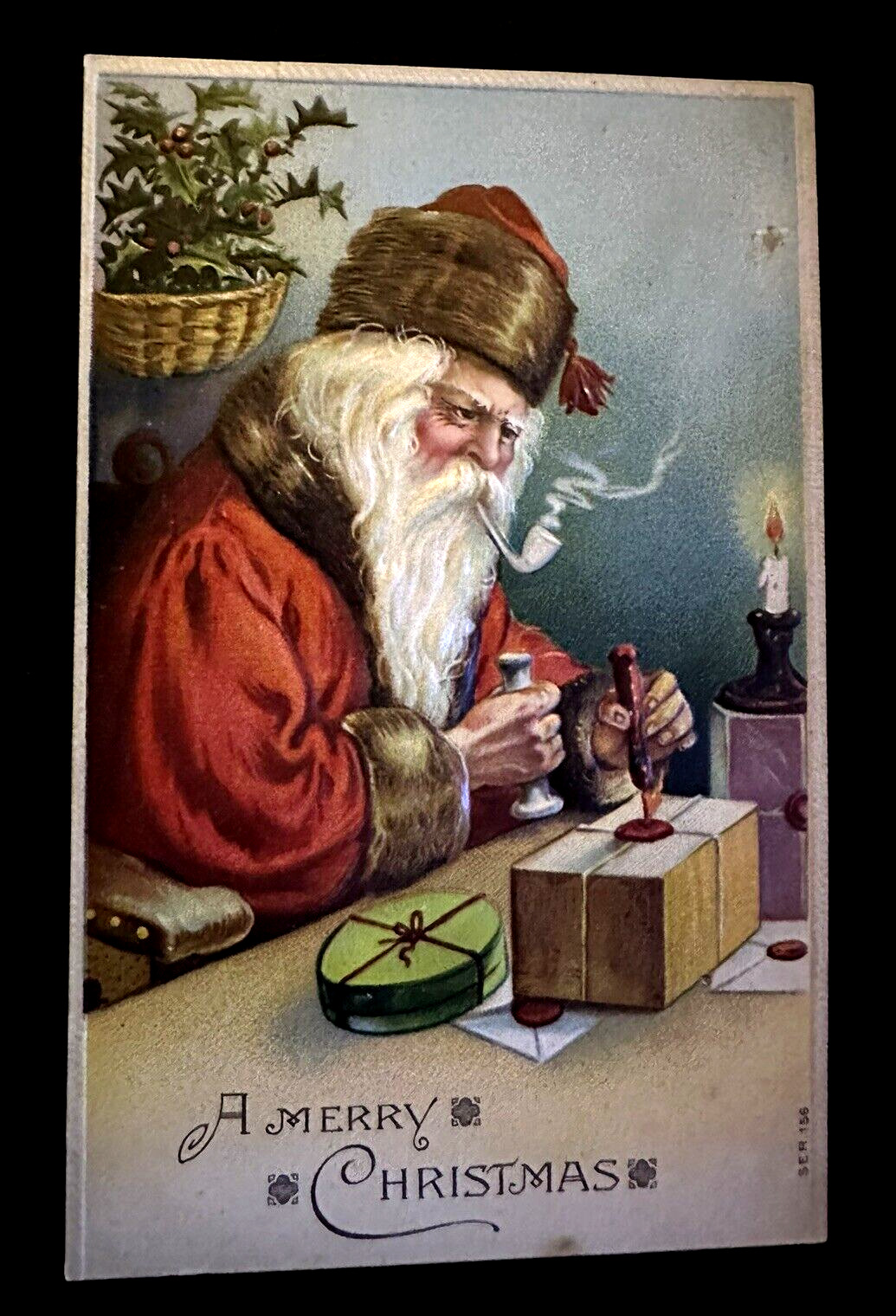 Santa Claus in Workshop with Gifts~Sealing Wax ~Antique Christmas~Postcard~~h722