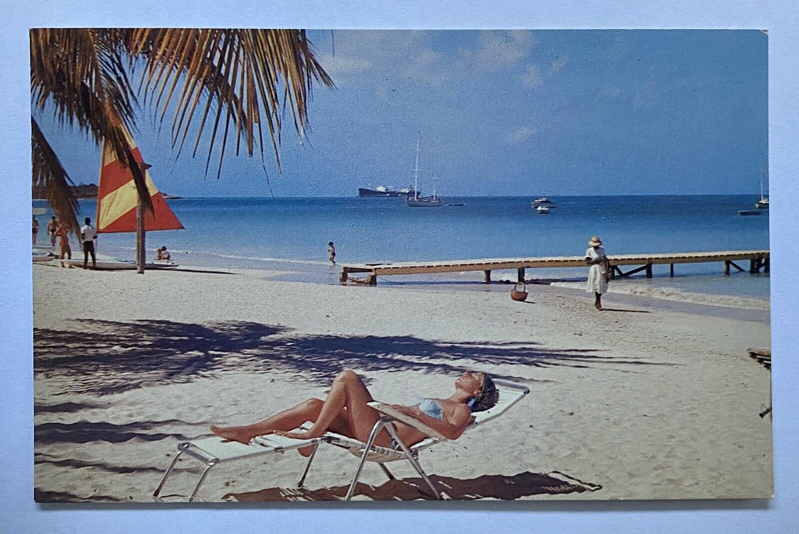 One of The Many Beautiful Caribbean Beaches Woman Sunbathing Scene PR Postcard