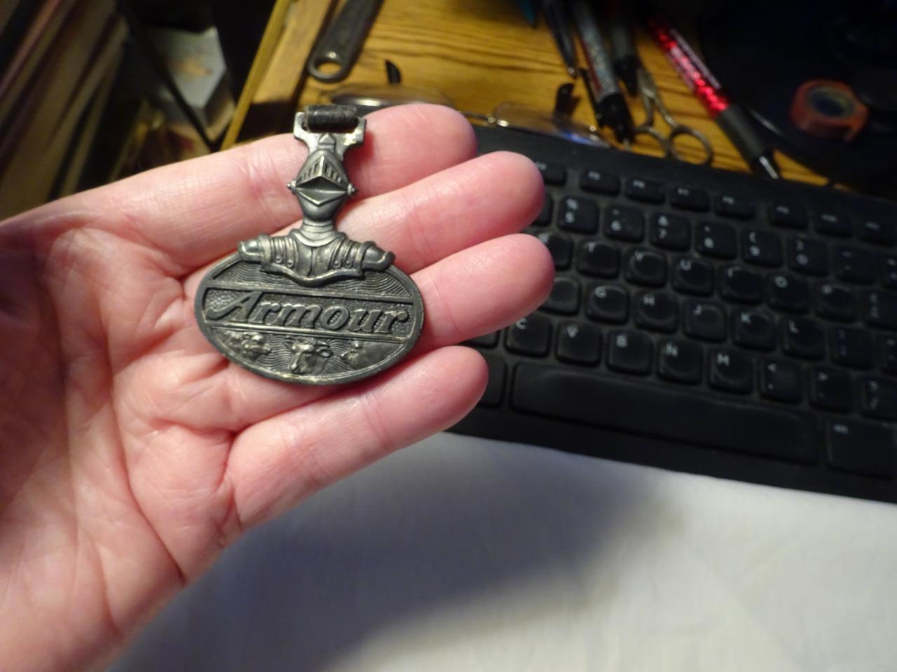 1918 ANTIQUE EMBOSSED ADVERTISING WATCH FOB \