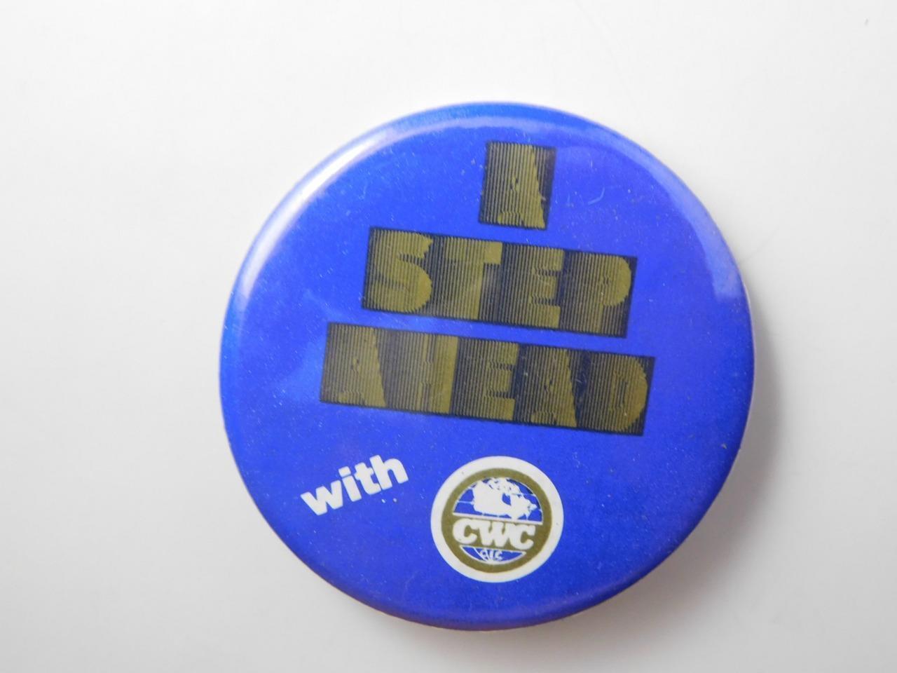 A STEP AHEAD CWC  OLC UNION VINTAGE BUTTON PIN  ADVERTISING
