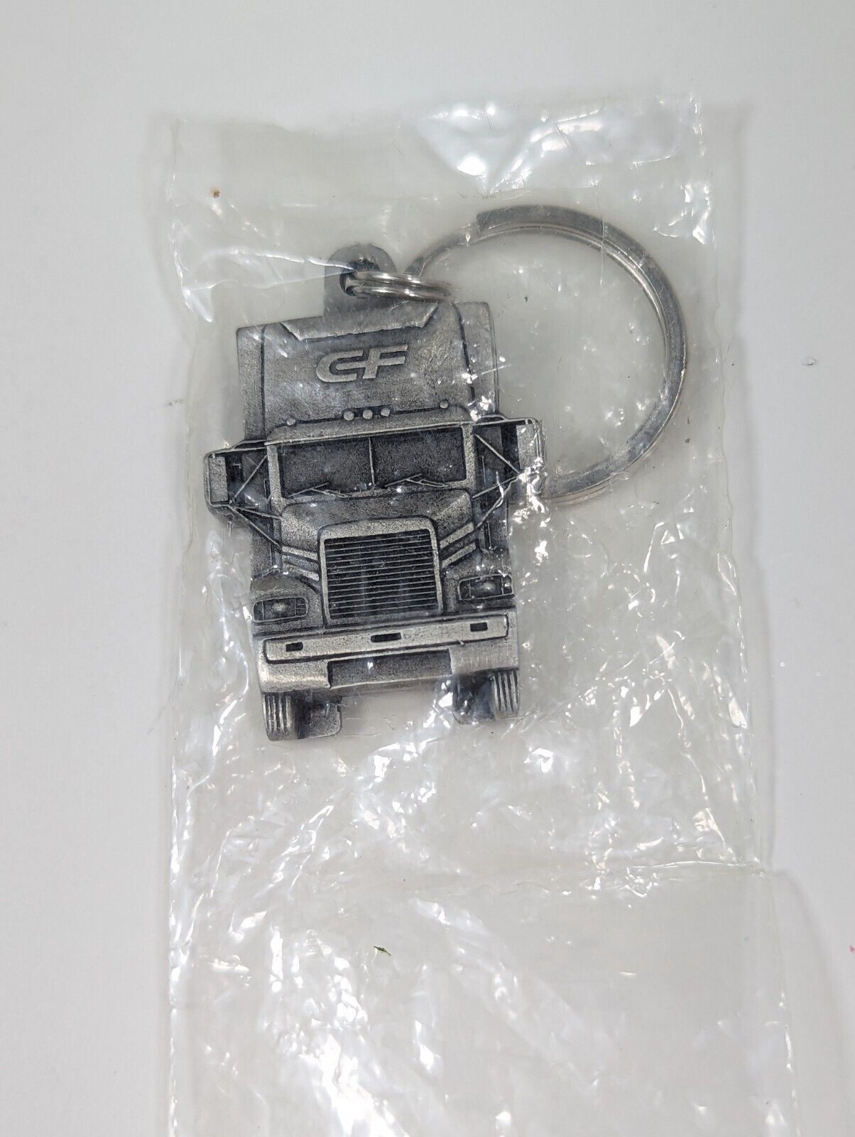 Vintage CF Semi Trucking Company Silver Keychain New in Package