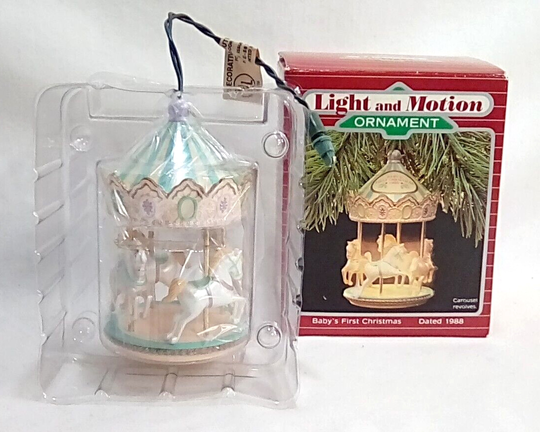 1988 Hallmark Baby's First Christmas  Carousel Light & Motion Ornament