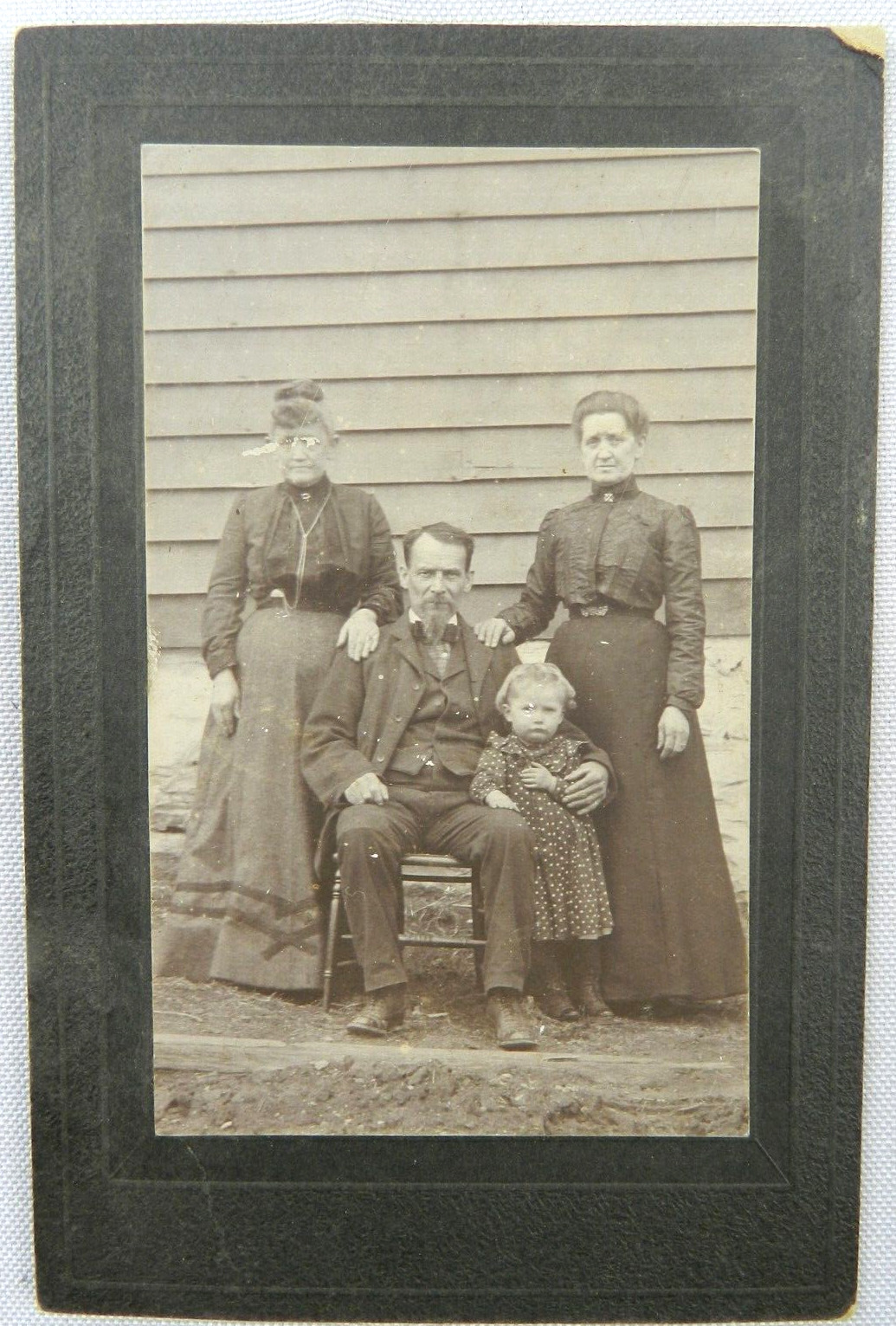 Family of Four Stand Outside Home in Formal Dress Portrait- c.1900s Cabinet Card