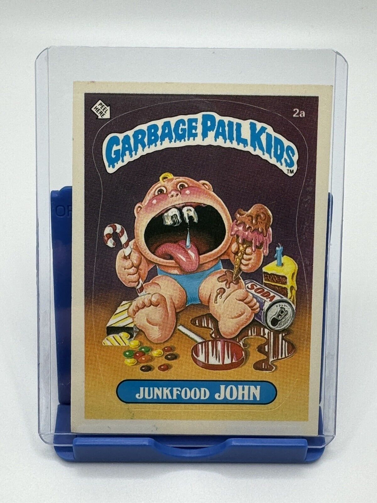 VTG 1985 Junkfood John # 2a Topps Garbage Pail kids GPK series 1 sticker card