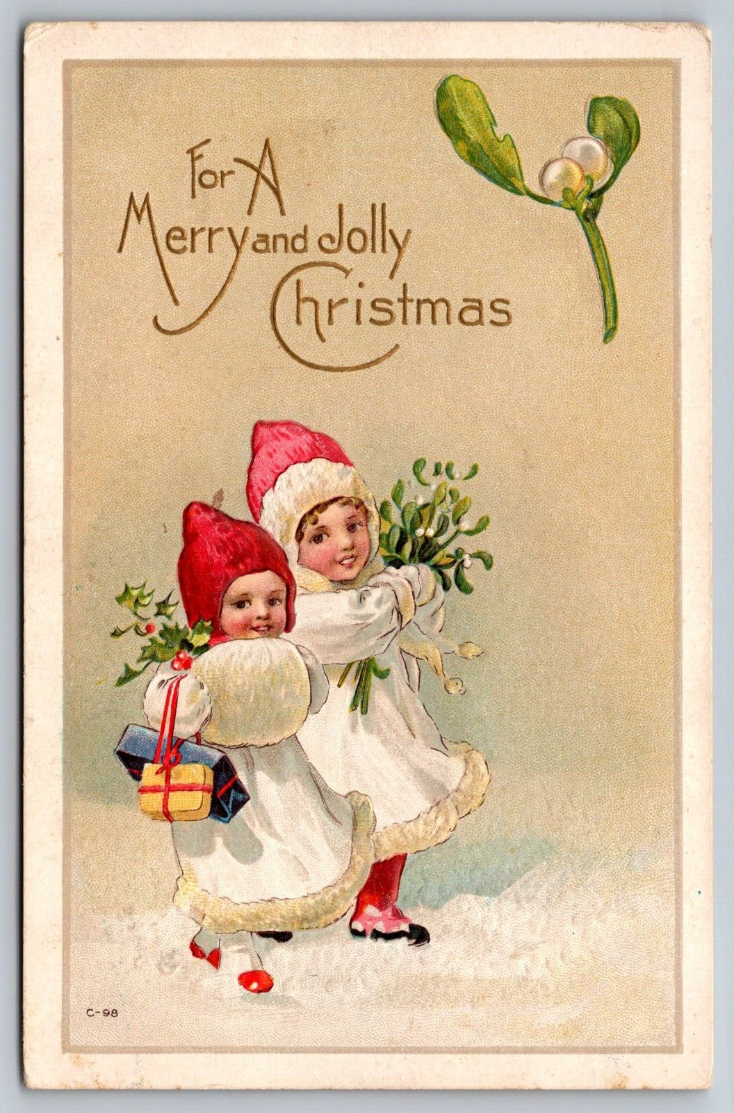 Postcard 1914 Embossed Christmas Children in the Snow with Mistletoe A30