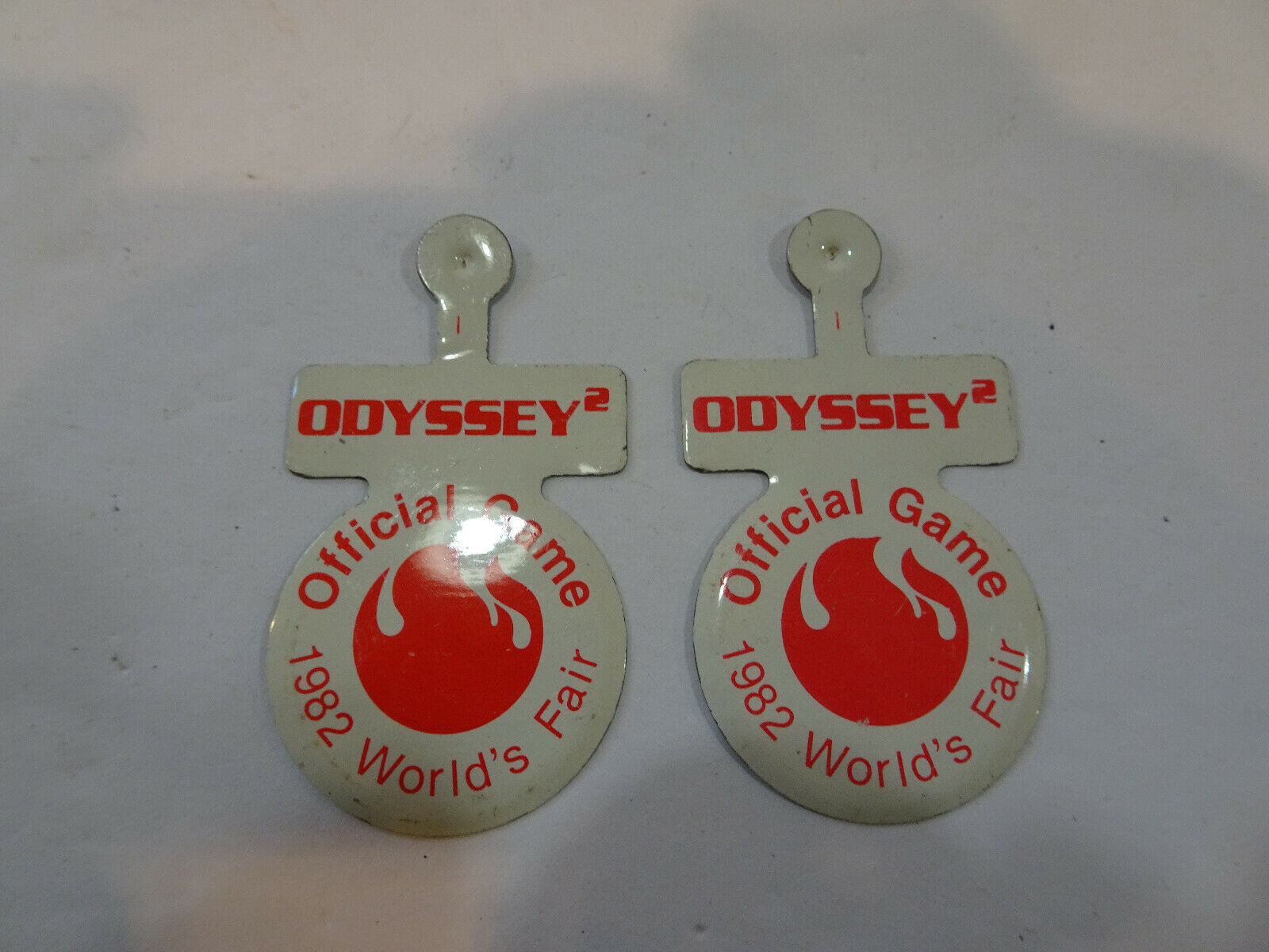 N.O.S. Pair of Magnavox  Odyssey 2 Official Game 1982 World\'s Fair buttons 