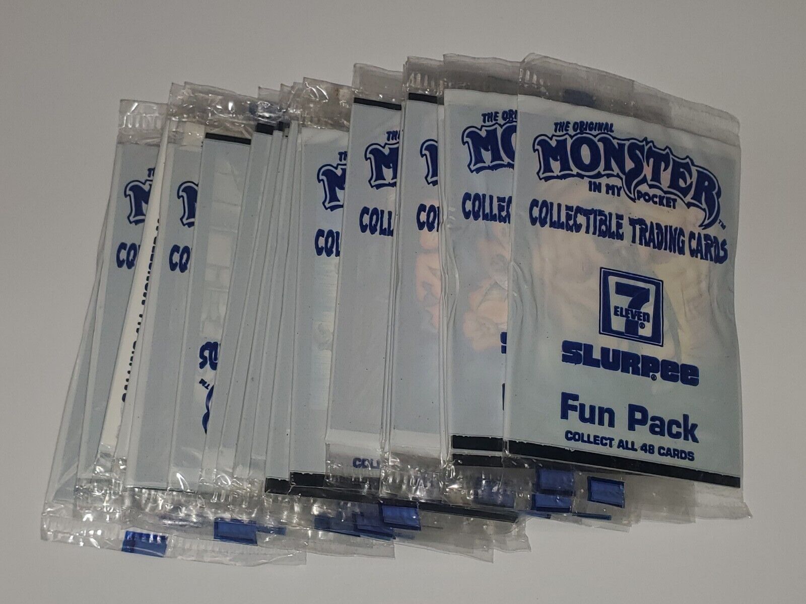 25 new & sealed 1991 Monster In My Pocket card packs. 7-Eleven Slurpee. 7-11