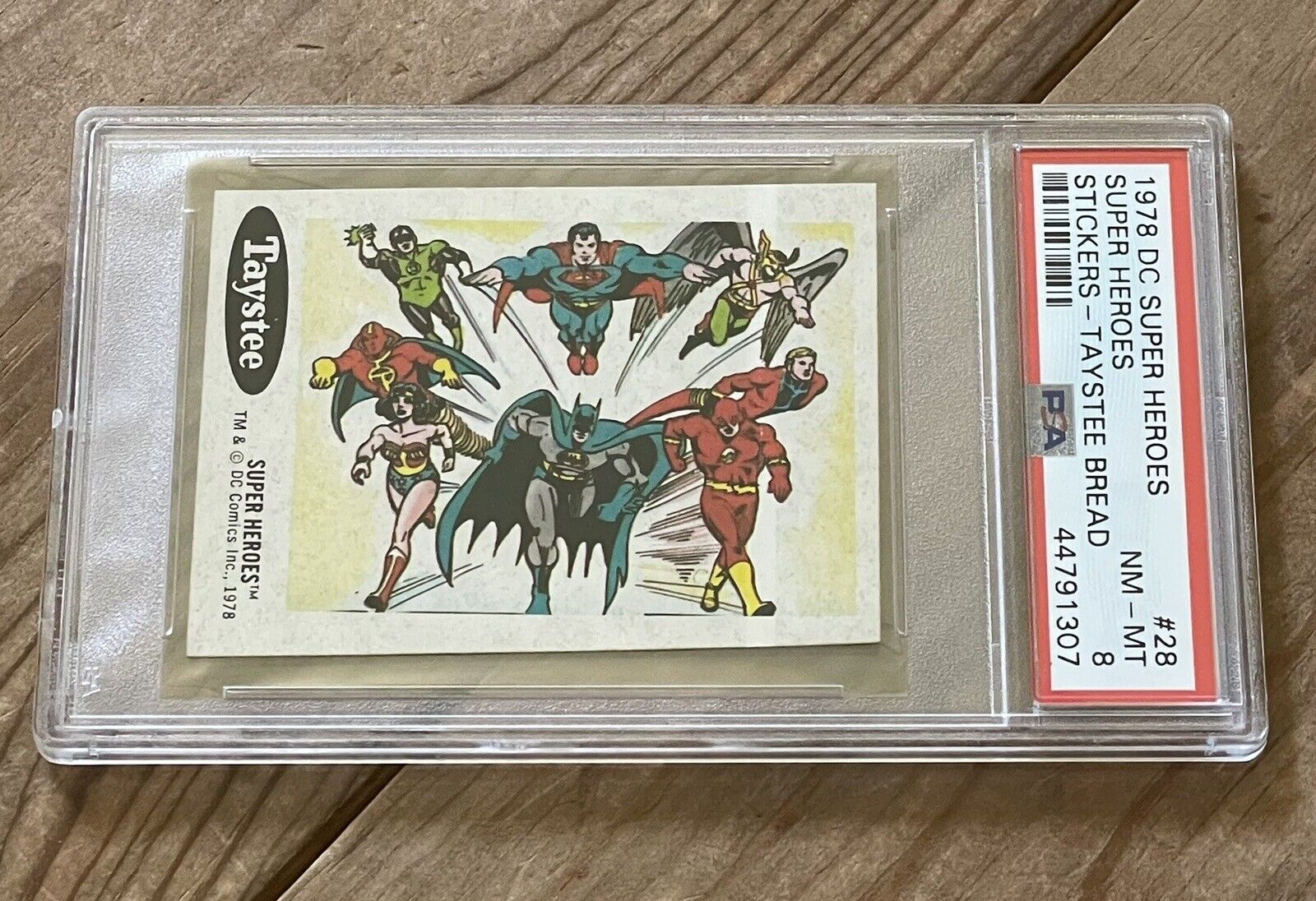 1978 Taystee Bread DC Super Heroes Stickers PSA 8 Excellent Justice League #28