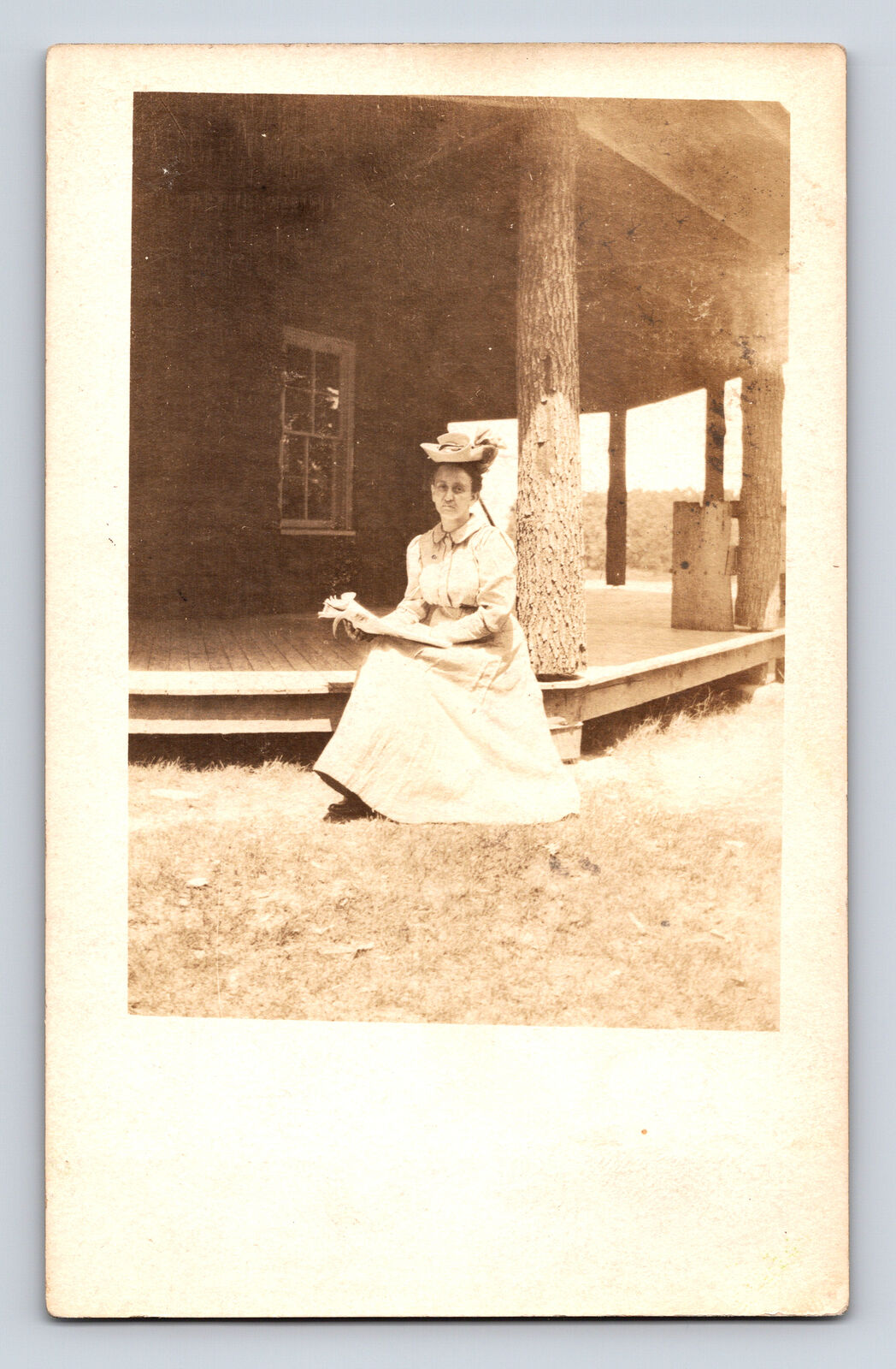 RPPC Portrait of Woman at Large Lodge Homestead Porch Maggie Postcard