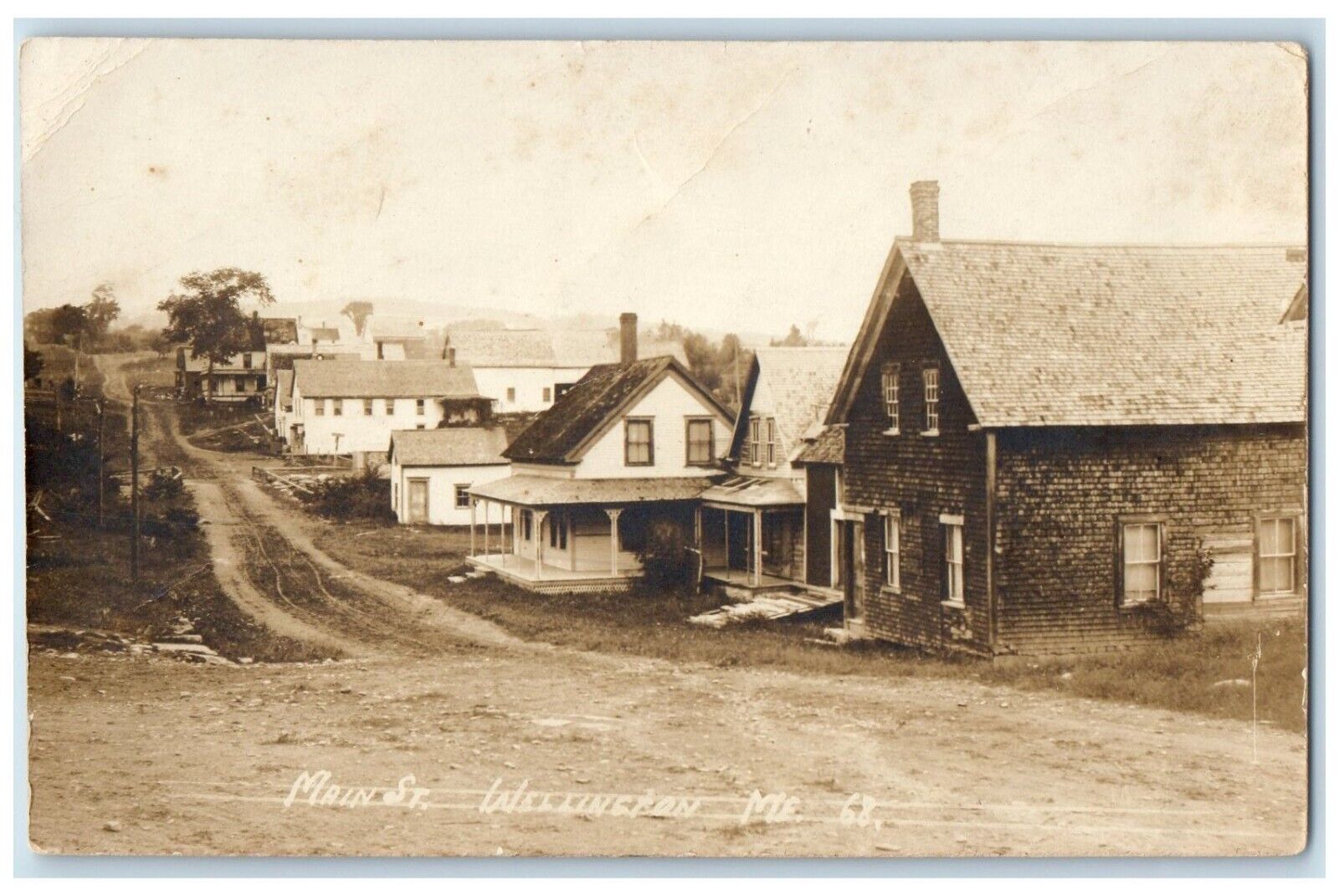 c1910\'s Main Street Wellington Maine ME Dirt Road RPPC Photo Antique Postcard