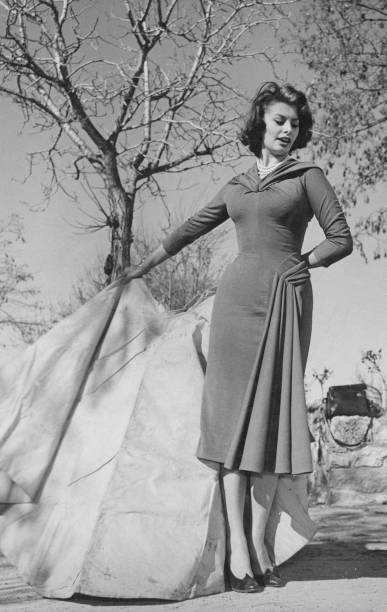 Italian actress Sophia Loren holds a red cape a lesson famous b- 1956 Old Photo
